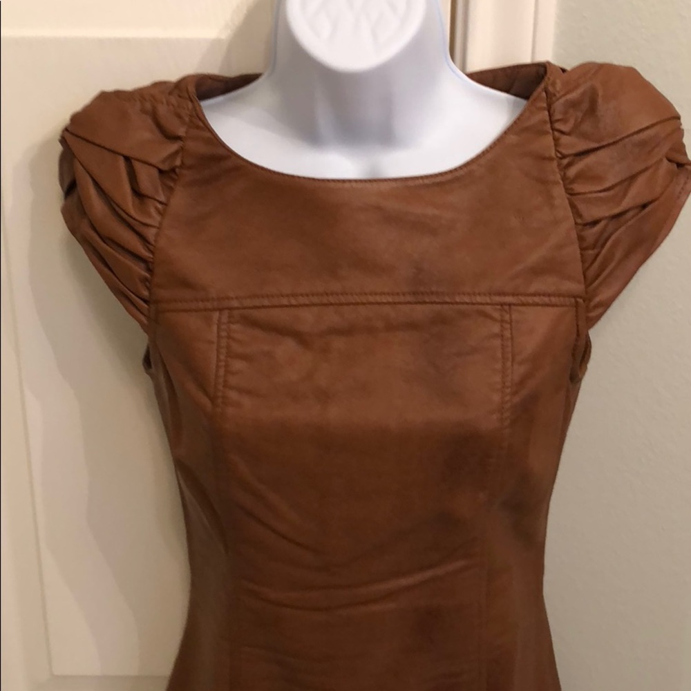 Faux leather mini with knot cap sleeves